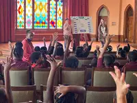 Students raising hands